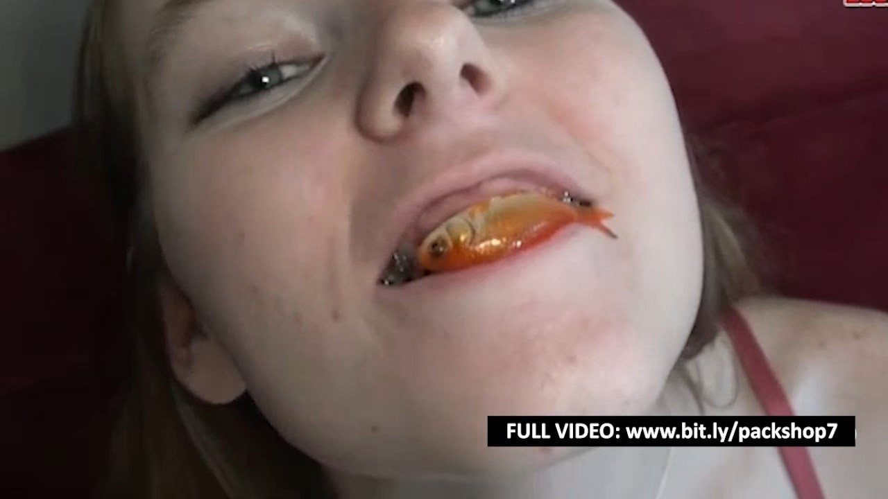 Pretty hungry girl swallows innocent fish Vore XXX Porn Video  